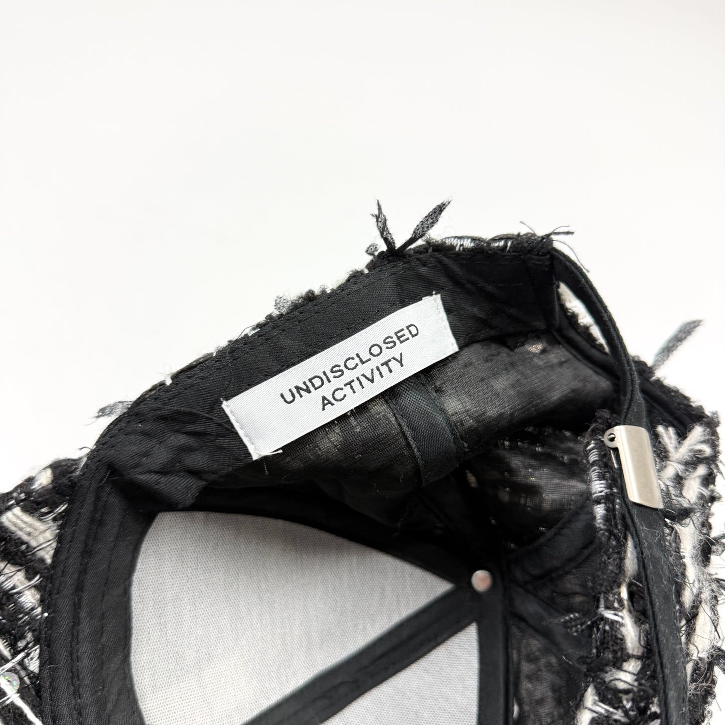 UNDISCLOSED ATELIER Tweed Time Traveller Kappe