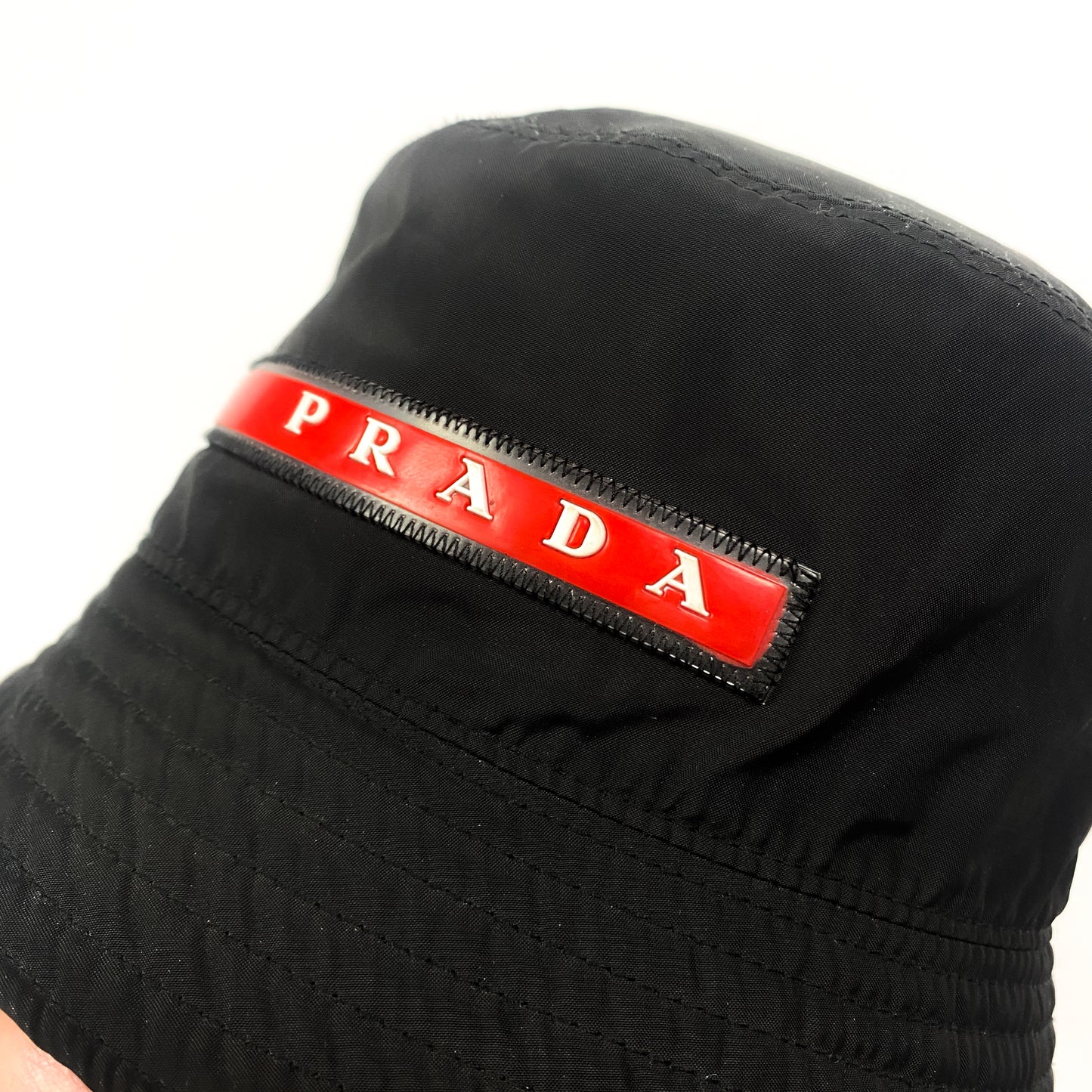 PRADA Linea Rossa Bucket Hat
